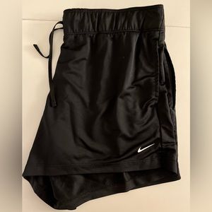 Women’s size large, black Nike shorts